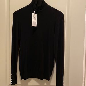 Black Zara turtleneck with pearl embellishments
